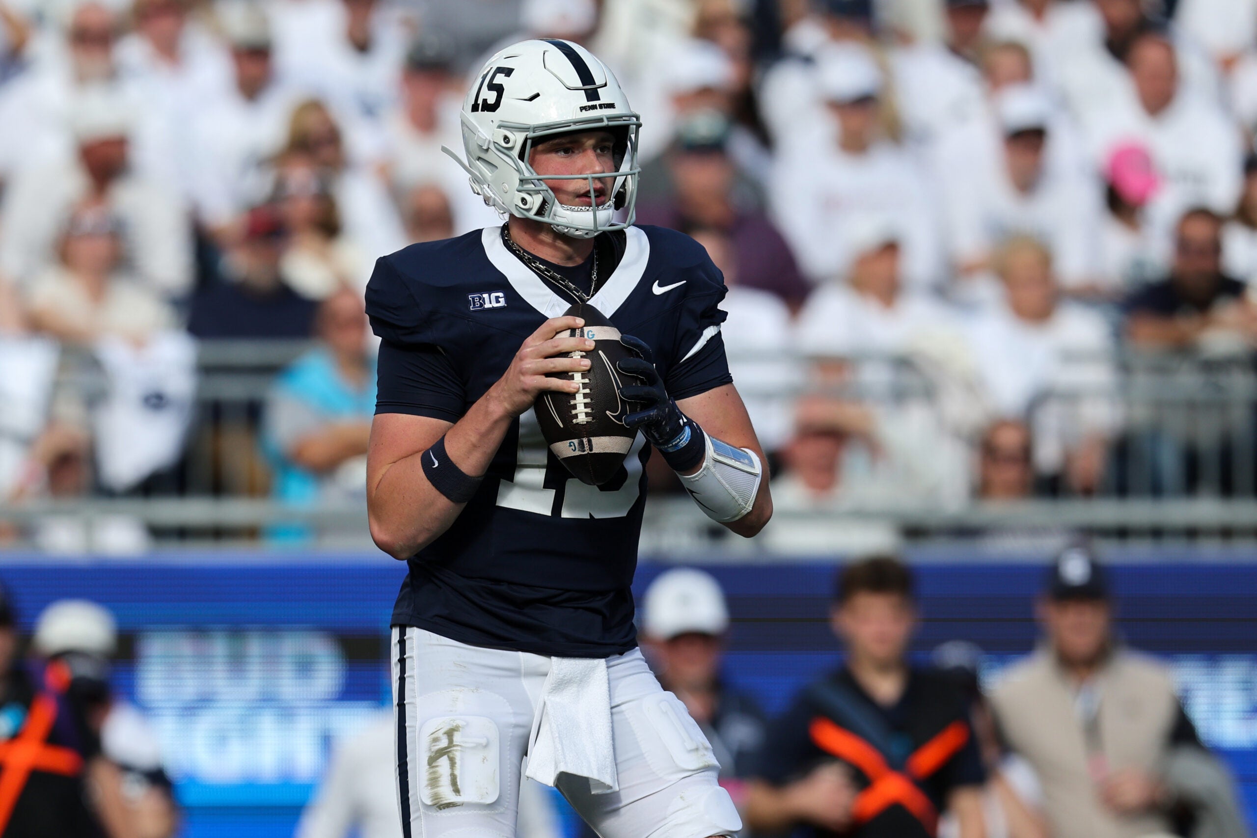 Oct 11, 2025; University Park, Pennsylvania, USA; Penn State Nittany Lions quarterback Drew Allar (15) drops back in the pocket during the first quarter against the Northwestern Wildcats at Beaver Stadium.