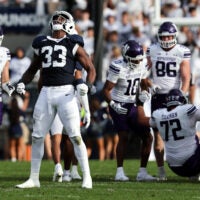 Oct 11, 2025; University Park, Pennsylvania, USA; Penn State Nittany Lions defensive end Dani Dennis-Sutton (33) reacts following a tackle during the second quarter against the Northwestern Wildcats at Beaver Stadium.