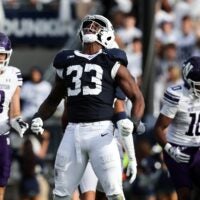 Oct 11, 2025; University Park, Pennsylvania, USA; Penn State Nittany Lions defensive end Dani Dennis-Sutton (33) reacts following a tackle during the second quarter against the Northwestern Wildcats at Beaver Stadium.