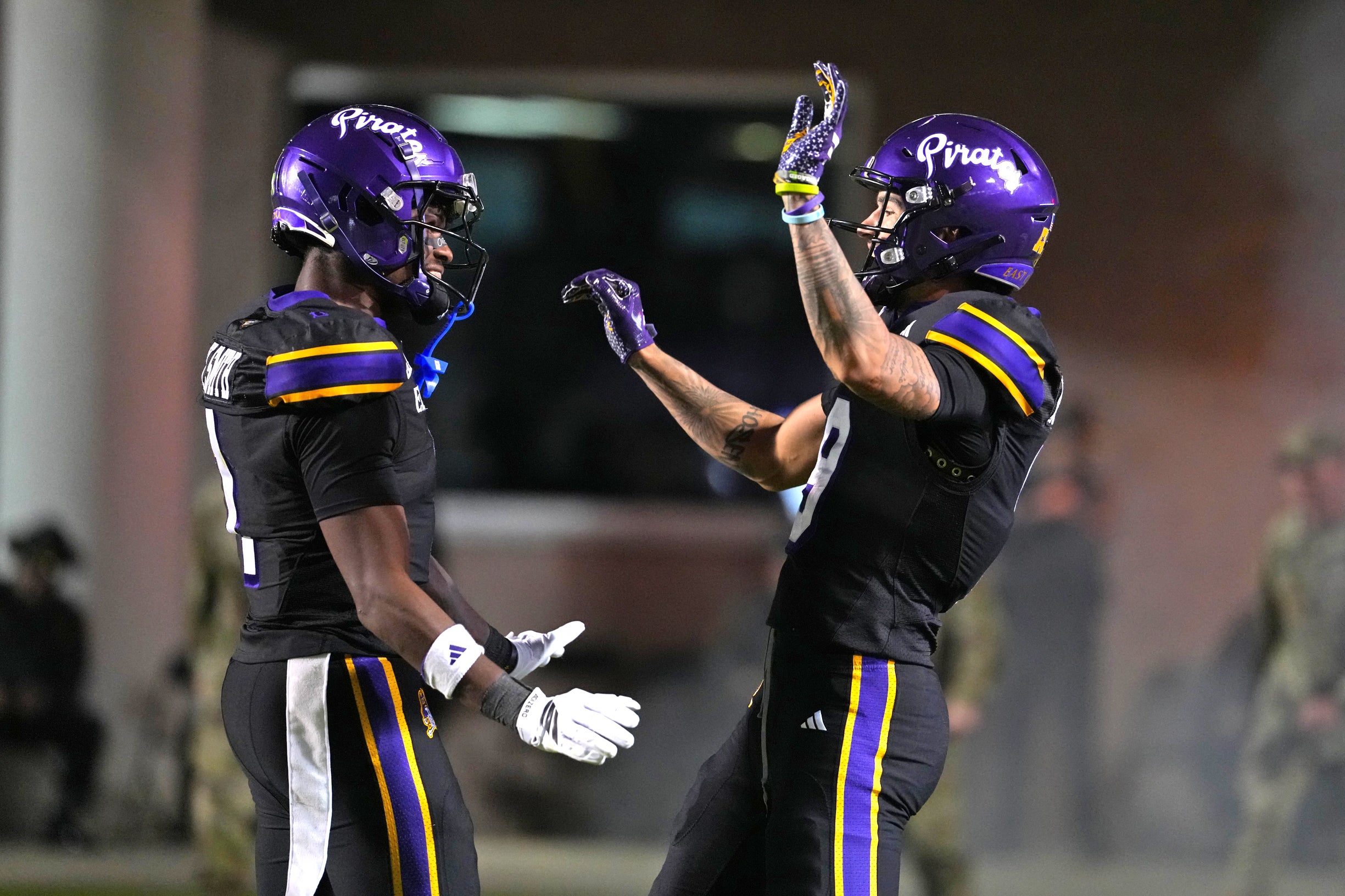 Oct 16, 2025; Greenville, North Carolina, USA; East Carolina Pirates wide receiver Anthony Smith (9) celebrates his touchdown catch with wide receiver Yannick Smith (1) against the Tulsa Golden Hurricane during the first half at Dowdy-Ficklen Stadium.