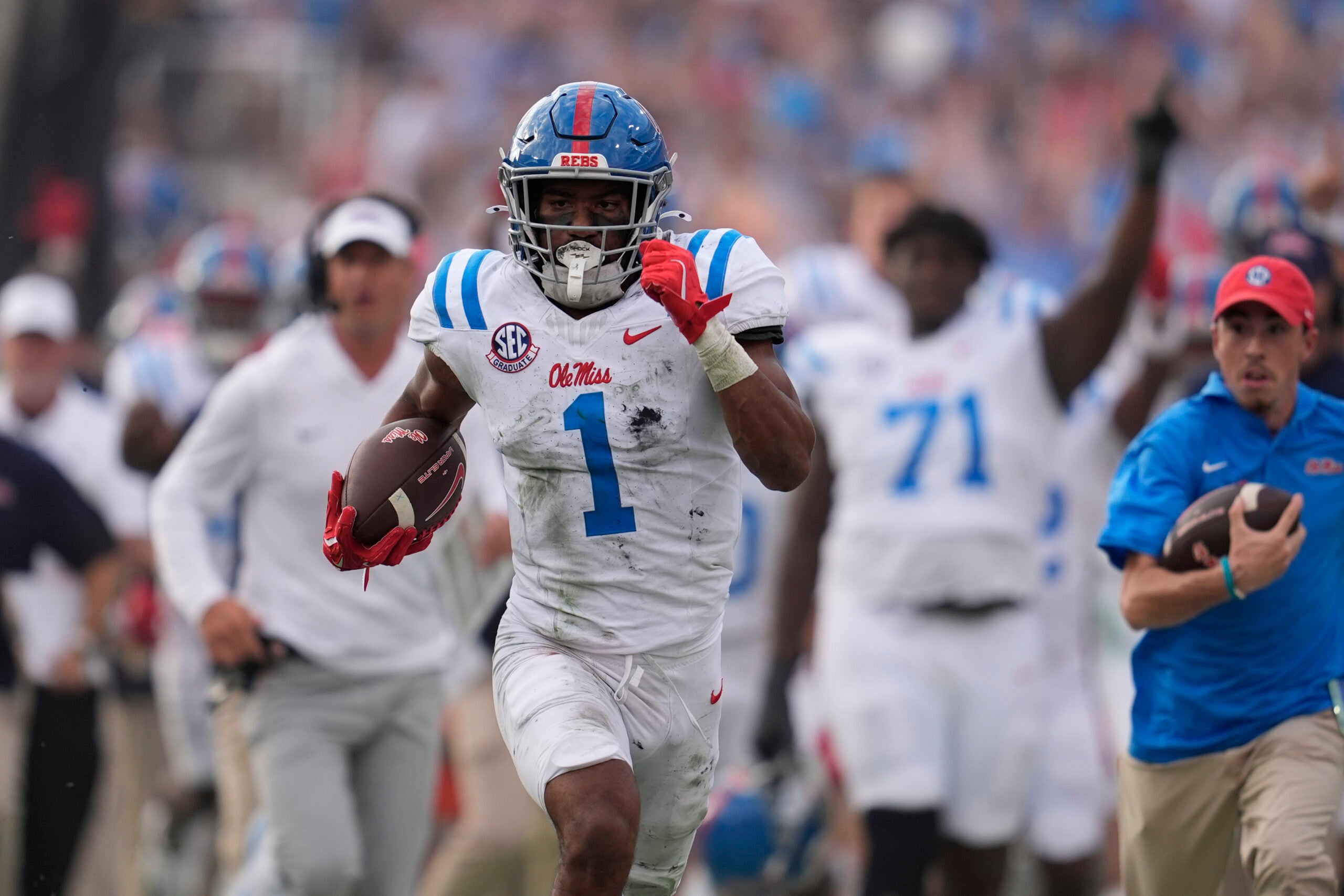 Oct 18, 2025; Athens, Georgia, USA; Mississippi Rebels wide receiver De'Zhaun Stribling (1) runs for a touchdown against the Georgia Bulldogs during the second half of the game at Sanford Stadium.