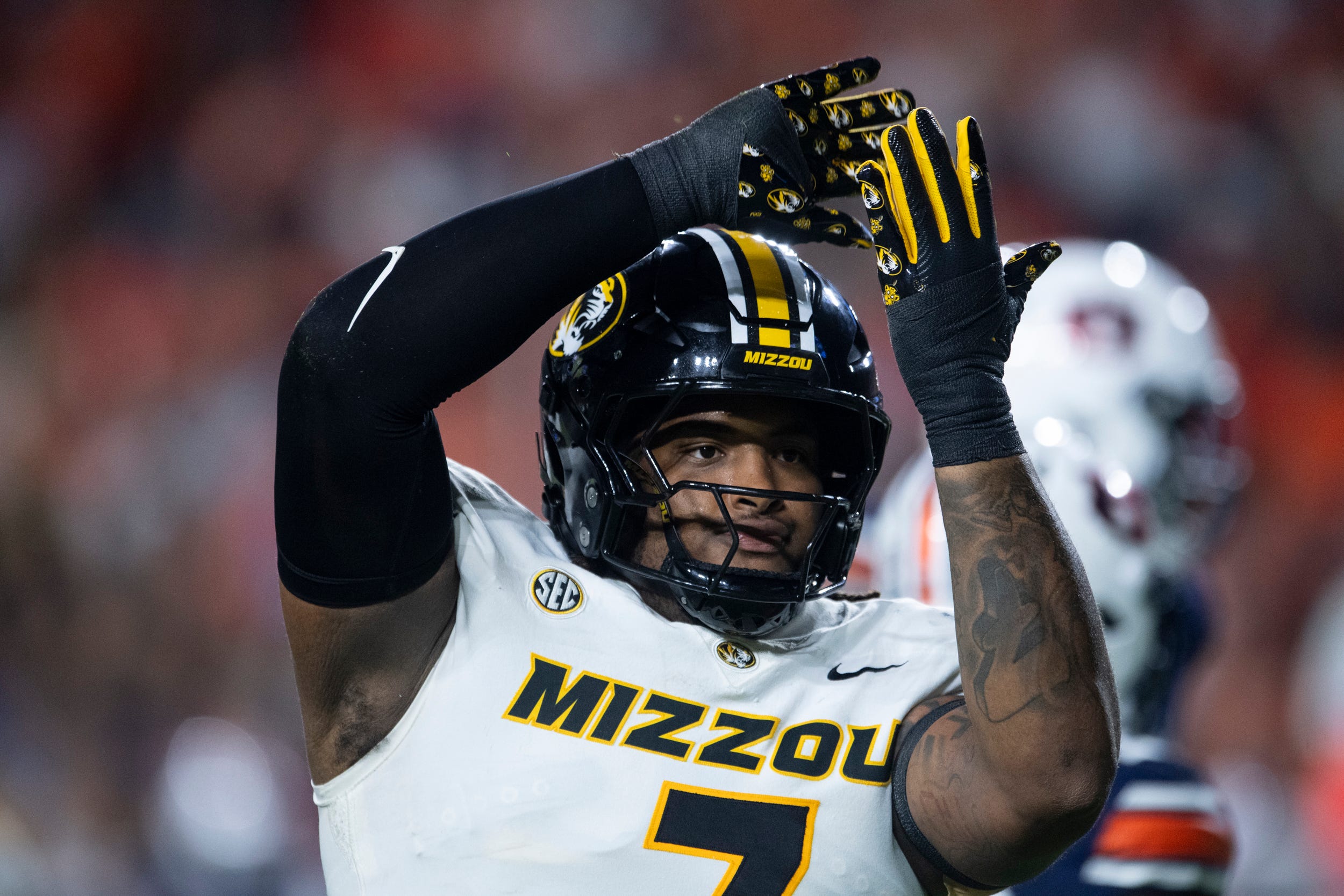 Missouri Tigers defensive tackle Chris McClellan (7) celebrates his sack as Auburn Tigers take on Missouri Tigers at Jordan-Hare Stadium in Auburn, Ala. on Saturday, Oct. 18, 2025. Missouri Tigers lead Auburn Tigers 10-7 at halftime.