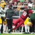 Arizona Cardinals receiver Marvin Harrison Jr. (18) catches a pass along the sidelines against the Green Bay Packers at State Farm Stadium in Glendale on Oct. 19, 2025.
