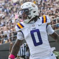 Oct 18, 2025; Nashville, Tennessee, USA; Louisiana State Tigers wide receiver Zavion Thomas (0) celebrates with his teammates after scoring a touchdown against the Vanderbilt Commodores during the second half at FirstBank Stadium.