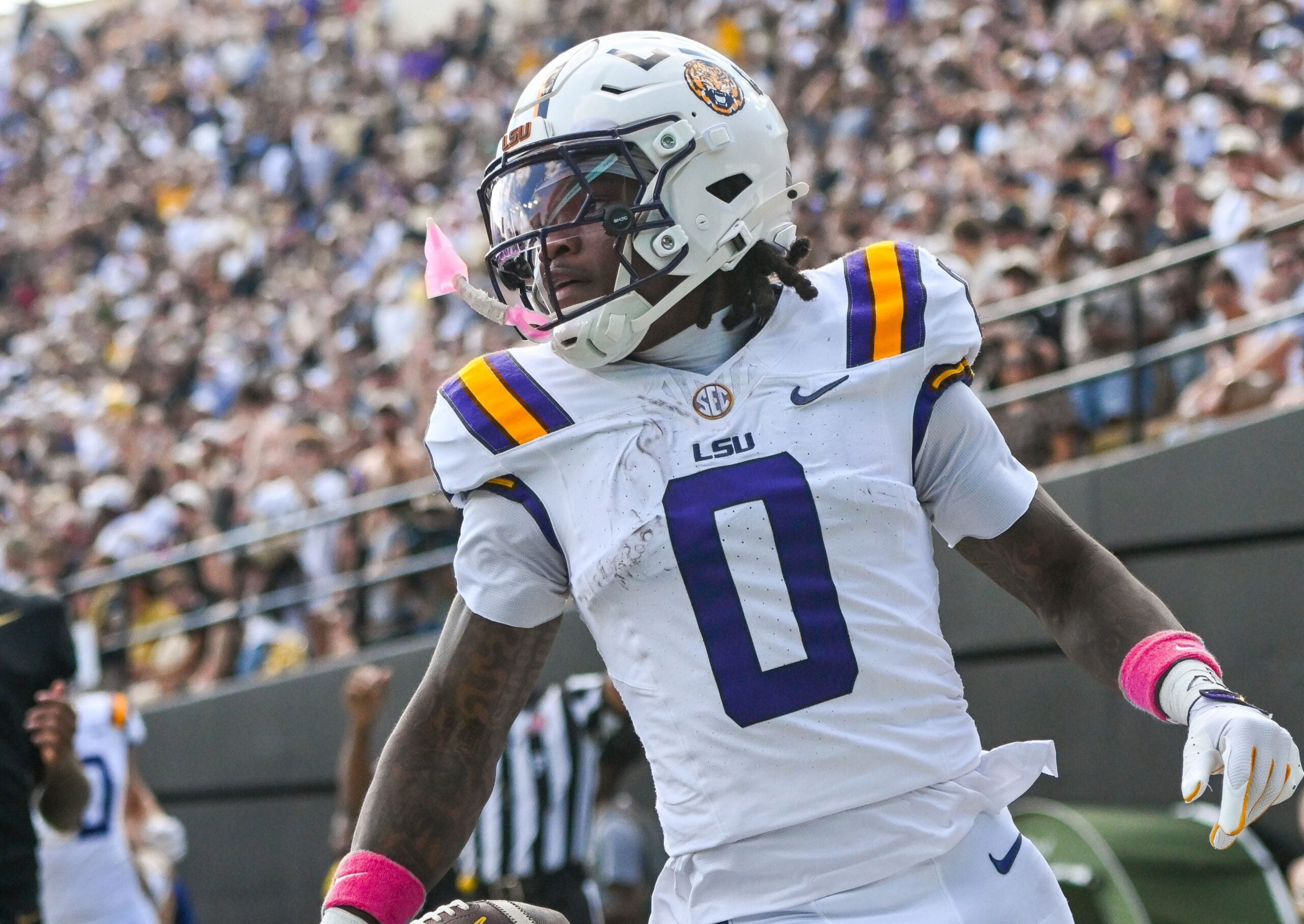 Oct 18, 2025; Nashville, Tennessee, USA; Louisiana State Tigers wide receiver Zavion Thomas (0) celebrates with his teammates after scoring a touchdown against the Vanderbilt Commodores during the second half at FirstBank Stadium.