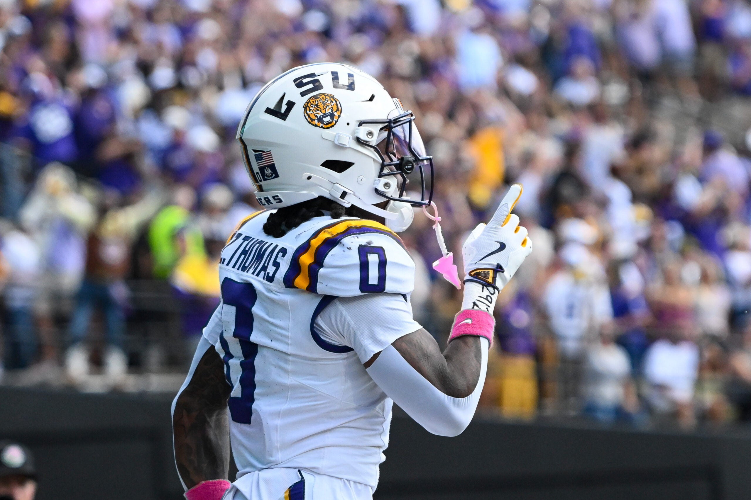 Oct 18, 2025; Nashville, Tennessee, USA; Louisiana State Tigers wide receiver Zavion Thomas (0) celebrates with his teammates after scoring a touchdown against the Vanderbilt Commodores during the second half at FirstBank Stadium.