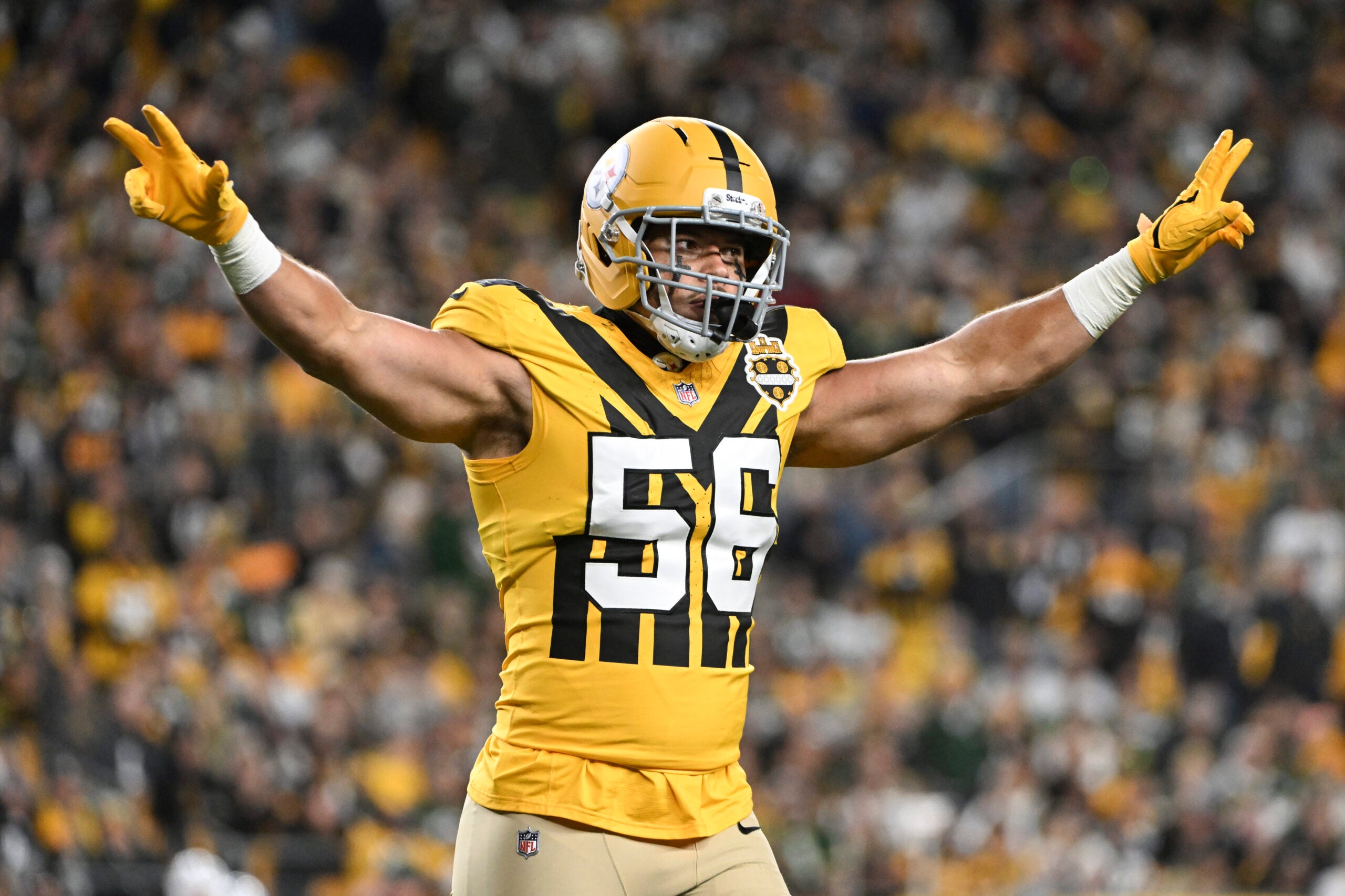 Oct 26, 2025; Pittsburgh, Pennsylvania, USA; Pittsburgh Steelers linebacker Alex Highsmith (56) celebrates a stop on third down against the Green Bay Packers during the second quarter at Acrisure Stadium.