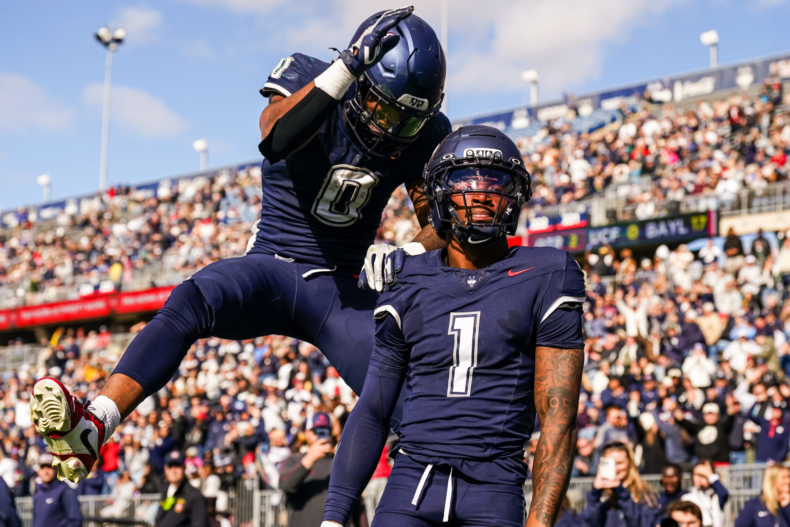 Nov 1, 2025; East Hartford, Connecticut, USA; UConn Huskies wide receiver Skyler Bell (1) reacts after his touchdown against the UAB Blazers in the second quarter at Pratt & Whitney Stadium at Rentschler Field.