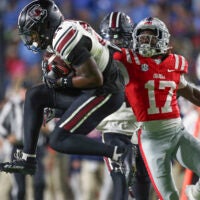 Nov 1, 2025; Oxford, Mississippi, USA; South Carolina Gamecocks defensive back Jalon Kilgore (24) intercepts a pass intended for Mississippi Rebels wide receiver Winston Watkins (17) during the second quarter at Vaught-Hemingway Stadium.