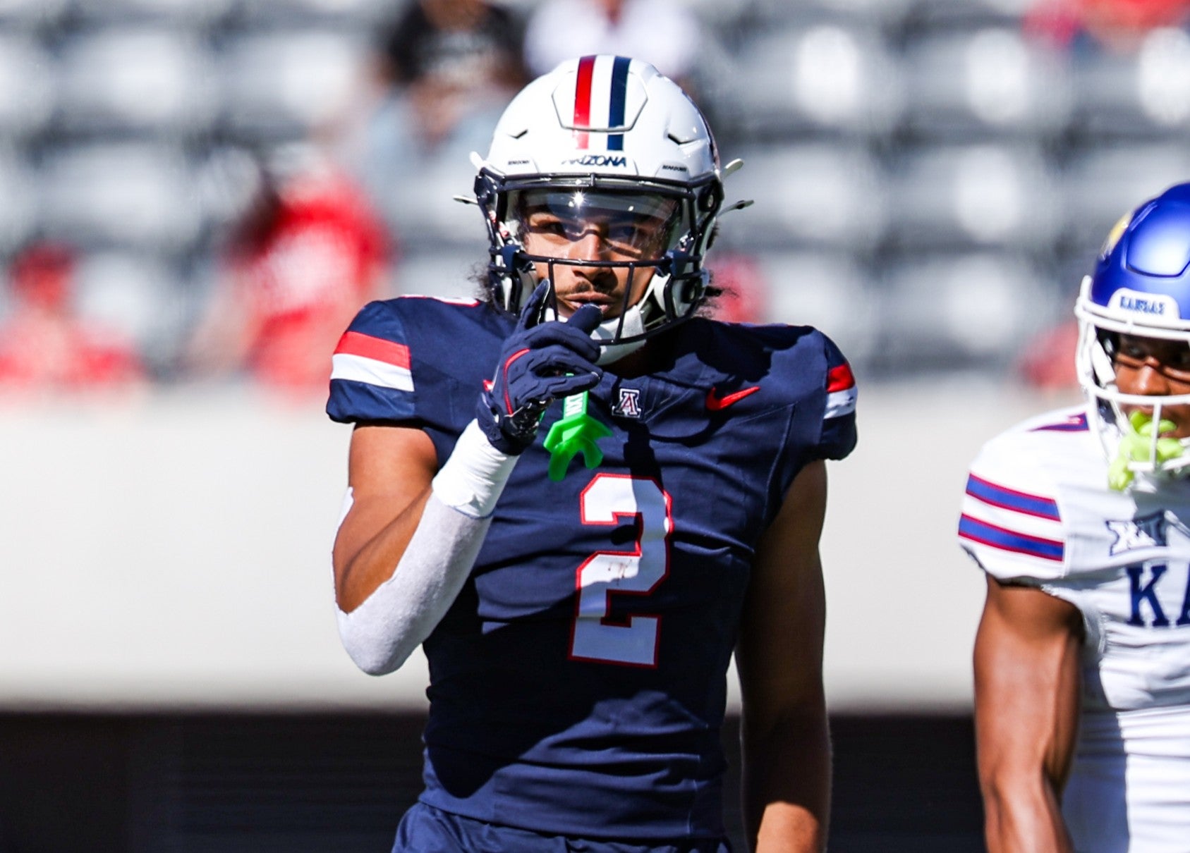 Nov 8, 2025; Tucson, Arizona, USA; Arizona Wildcats defensive back Treydan Stukes (2) celebrates during the first quarter of the game against the Kansas Jayhawks at Arizona Stadium.