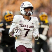 Nov 8, 2025; Columbia, Missouri, USA; Texas A&M Aggies wide receiver KC Concepcion (7) runs for a touchdown during the second half against the Missouri Tigers at Faurot Field at Memorial Stadium.