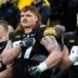 Iowa Hawkeyes offensive lineman Gennings Dunker (67), center, stands with teammates for the national anthem Nov. 8, 2025 before a Big Ten Football game against the Oregon Ducks at Kinnick Stadium in Iowa City, Iowa.