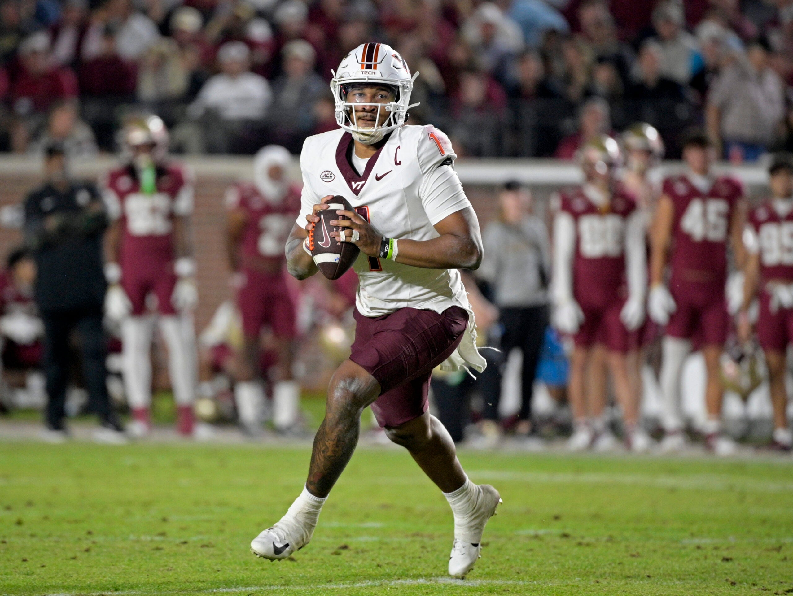 Nov 15, 2025; Tallahassee, Florida, USA; Virginia Tech Hokies quarterback Kyron Drones (1) looks to pass during the second half against the Florida State Seminoles at Doak S. Campbell Stadium.