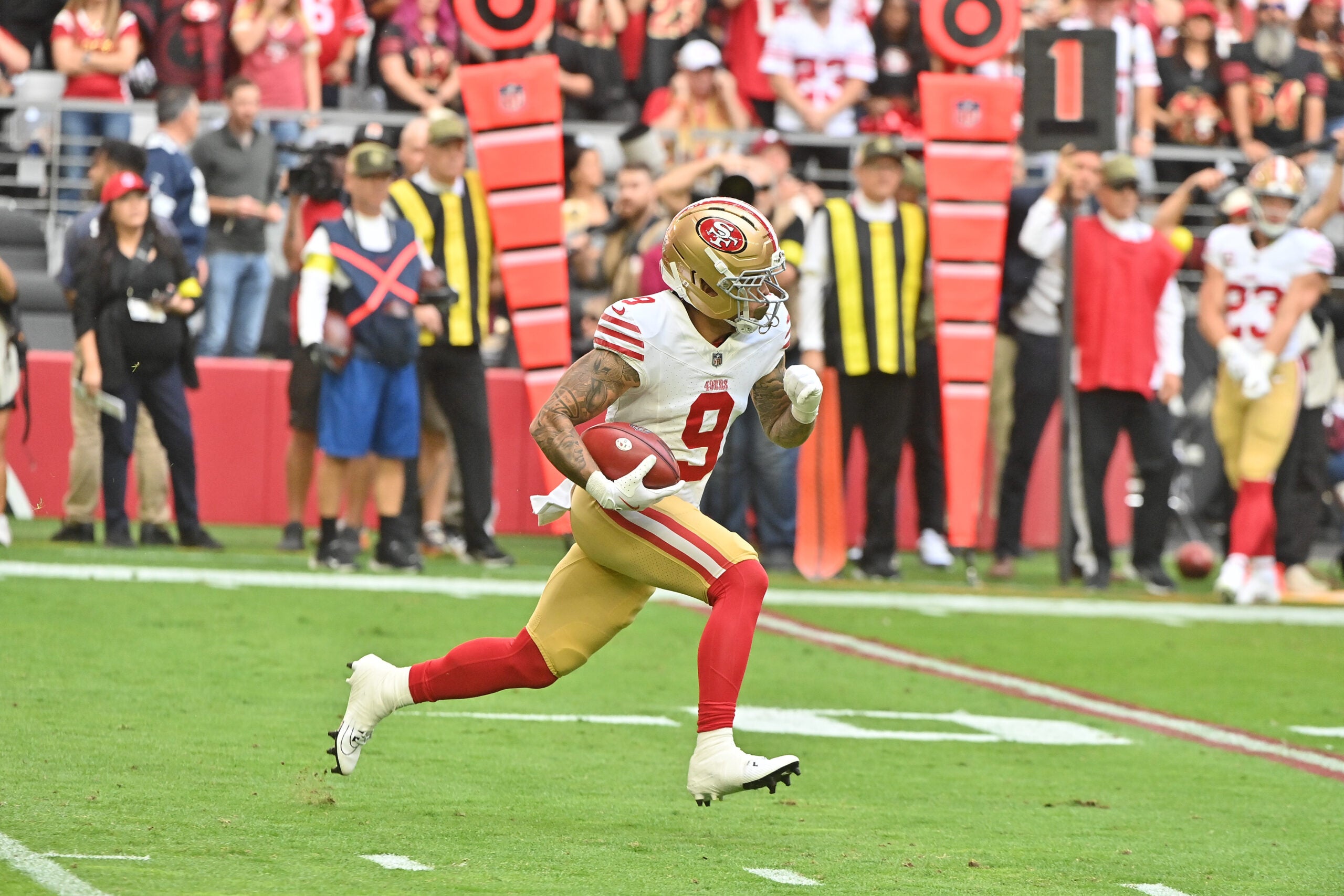 Nov 16, 2025; Glendale, Arizona, USA; San Francisco 49ers wide receiver Skyy Moore (9) runs with the ball in the first quarter against the Arizona Cardinals at State Farm Stadium.