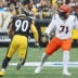 Nov 16, 2025; Pittsburgh, Pennsylvania, USA; Cincinnati Bengals offensive tackle Amarius Mims (71) gets in position to block Pittsburgh Steelers linebacker T.J. Watt (90) during the second half at Acrisure Stadium.