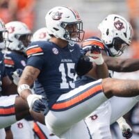 Auburn Tigers defensive end Keldric Faulk (15) warms up before Auburn Tigers take on Mercer Bears at Jordan-Hare Stadium in Auburn, Ala. on Saturday, Nov. 22, 2025.