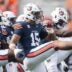 Auburn Tigers defensive end Keldric Faulk (15) warms up before Auburn Tigers take on Mercer Bears at Jordan-Hare Stadium in Auburn, Ala. on Saturday, Nov. 22, 2025.