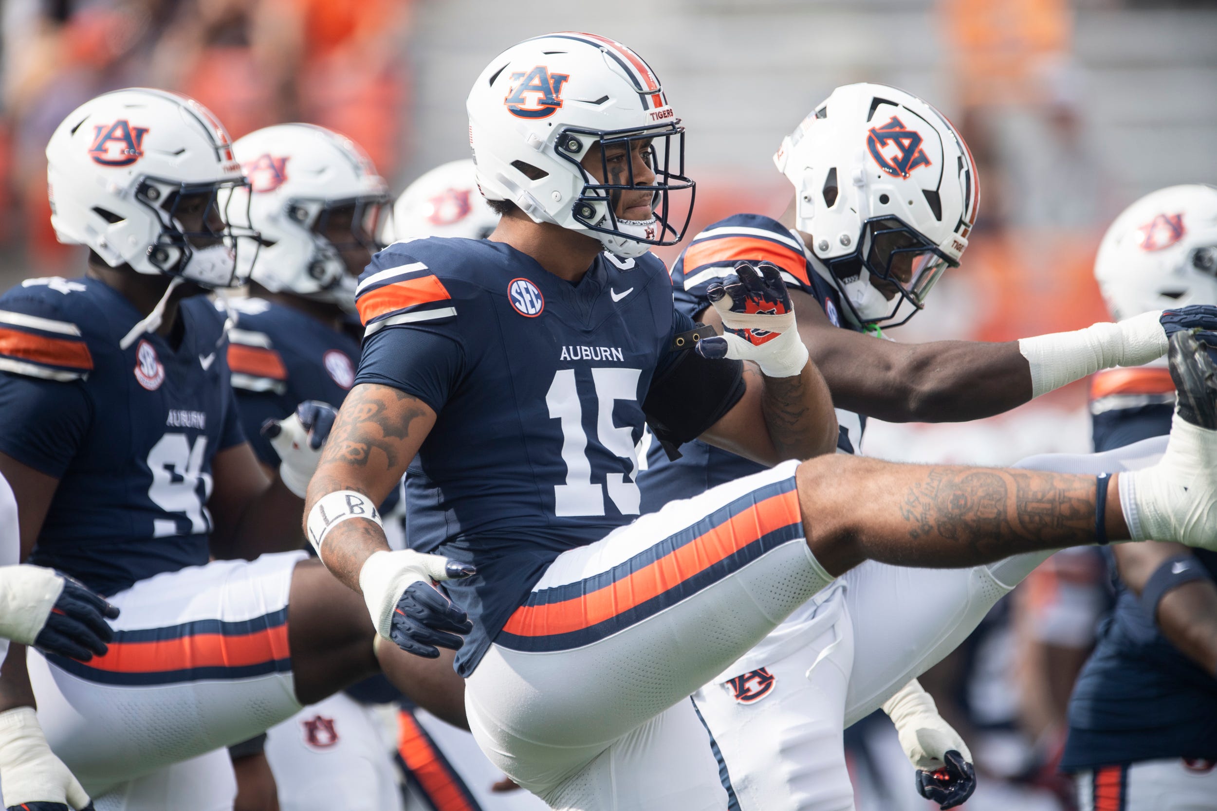 Auburn Tigers defensive end Keldric Faulk (15) warms up before Auburn Tigers take on Mercer Bears at Jordan-Hare Stadium in Auburn, Ala. on Saturday, Nov. 22, 2025.