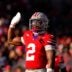 Ohio State Buckeyes defensive back Caleb Downs (2) celebrates after sacking Rutgers Scarlet Knights quarterback Athan Kaliakmanis (16) in the second half of the NCAA football game at Ohio Stadium on Saturday, Nov. 22, 2025 in Columbus, Ohio.