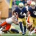 Notre Dame running back Jeremiyah Love (4) runs with the ball on his way to score a touchdown in the first half of a NCAA football game against Syracuse at Notre Dame Stadium on Saturday, Nov. 22, 2025, in South Bend.