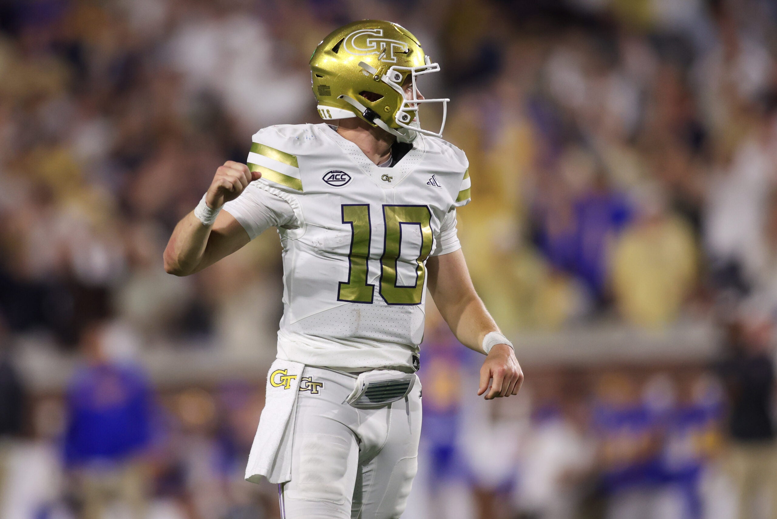 Nov 22, 2025; Atlanta, Georgia, USA; Georgia Tech Yellow Jackets quarterback Haynes King (10) reacts after a touchdown pass against the Pittsburgh Panthers in the second quarter at Bobby Dodd Stadium at Hyundai Field.