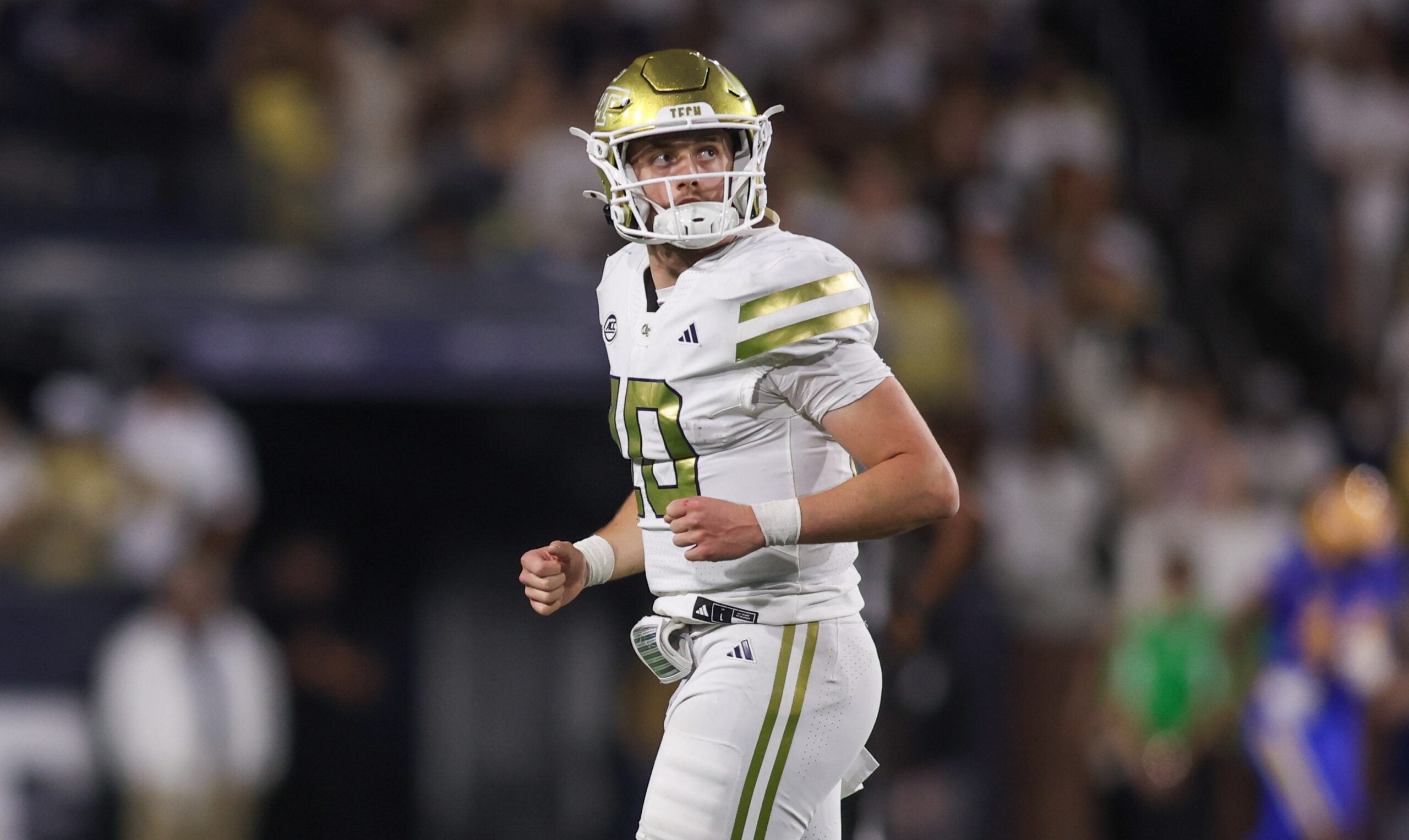 Nov 22, 2025; Atlanta, Georgia, USA; Georgia Tech Yellow Jackets quarterback Haynes King (10) reacts after throwing an interception for a touchdown against the Pittsburgh Panthers in the third quarter at Bobby Dodd Stadium at Hyundai Field.