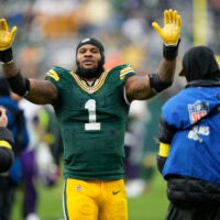 Nov 23, 2025; Green Bay, Wisconsin, USA; Green Bay Packers defensive end Micah Parsons (1) celebrates the victory over the Minnesota Vikings at Lambeau Field.