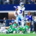 Nov 23, 2025; Arlington, Texas, USA; Dallas Cowboys wide receiver George Pickens (3) reacts after making a catch over Philadelphia Eagles cornerback Cooper DeJean (33) and Philadelphia Eagles safety Sydney Brown (21) during the game at AT&T Stadium.