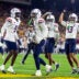 Nov 28, 2025; Tempe, Arizona, USA; Arizona Wildcats defensive back Treydan Stukes (2) celebrates with defensive back Ayden Garnes (9) after an interception against Arizona State Sun Devils in the second half during the 99th Territorial Cup at Mountain America Stadium.