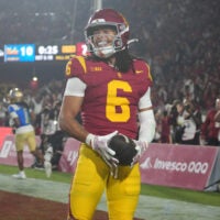 Nov 29, 2025; Los Angeles, California, USA; Southern California Trojans wide receiver Makai Lemon (6) celebrates after catching a 32-yard touchdown pass against the UCLA Bruins in the second half at United Airlines Field at Los Angeles Memorial Coliseum.