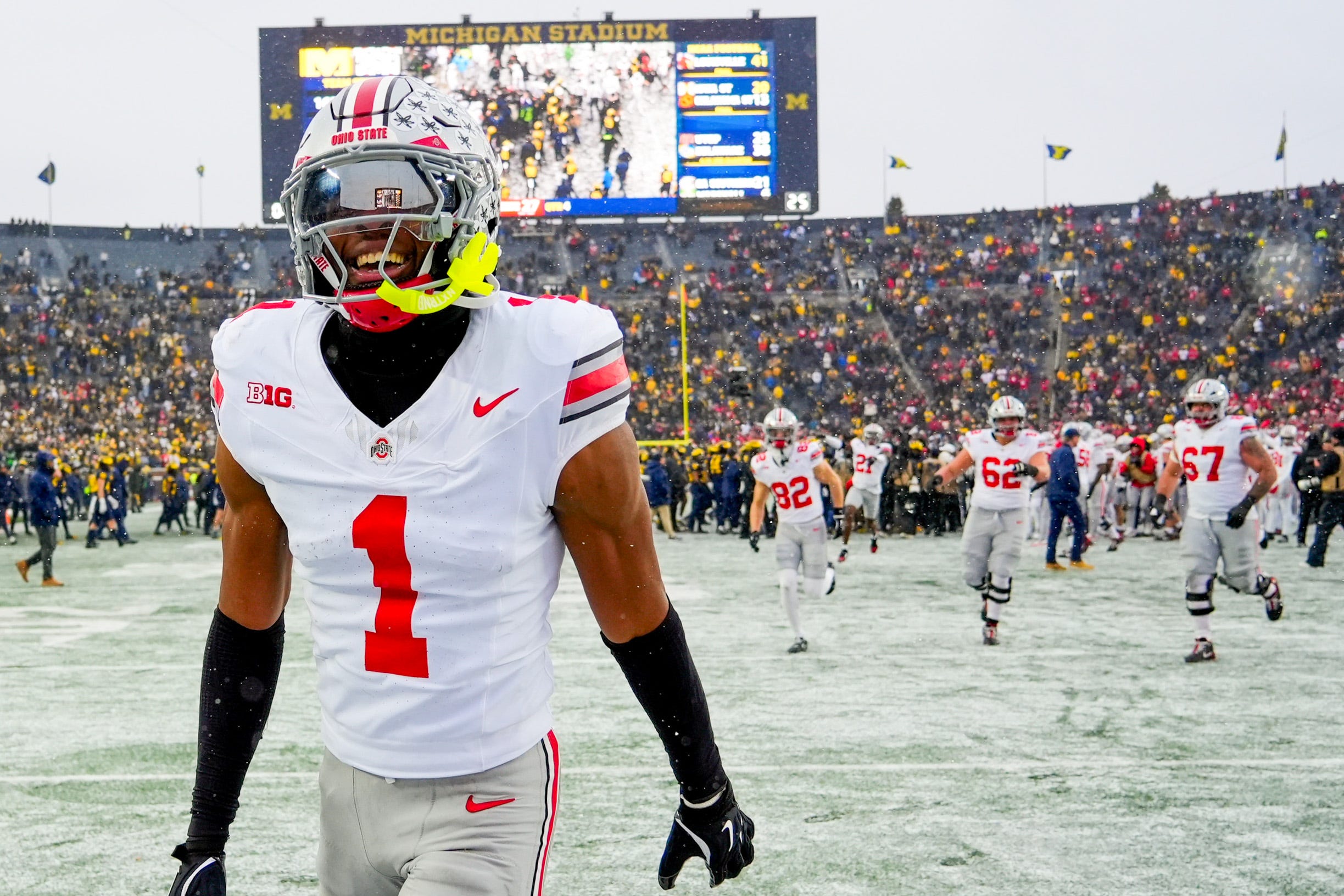 Ohio State Buckeyes cornerback Davison Igbinosun (1) celebrates after defeating the Michigan Wolverines in the NCAA football game at Michigan Stadium on Saturday, Nov. 29, 2025 in Ann Arbor, Michigan.