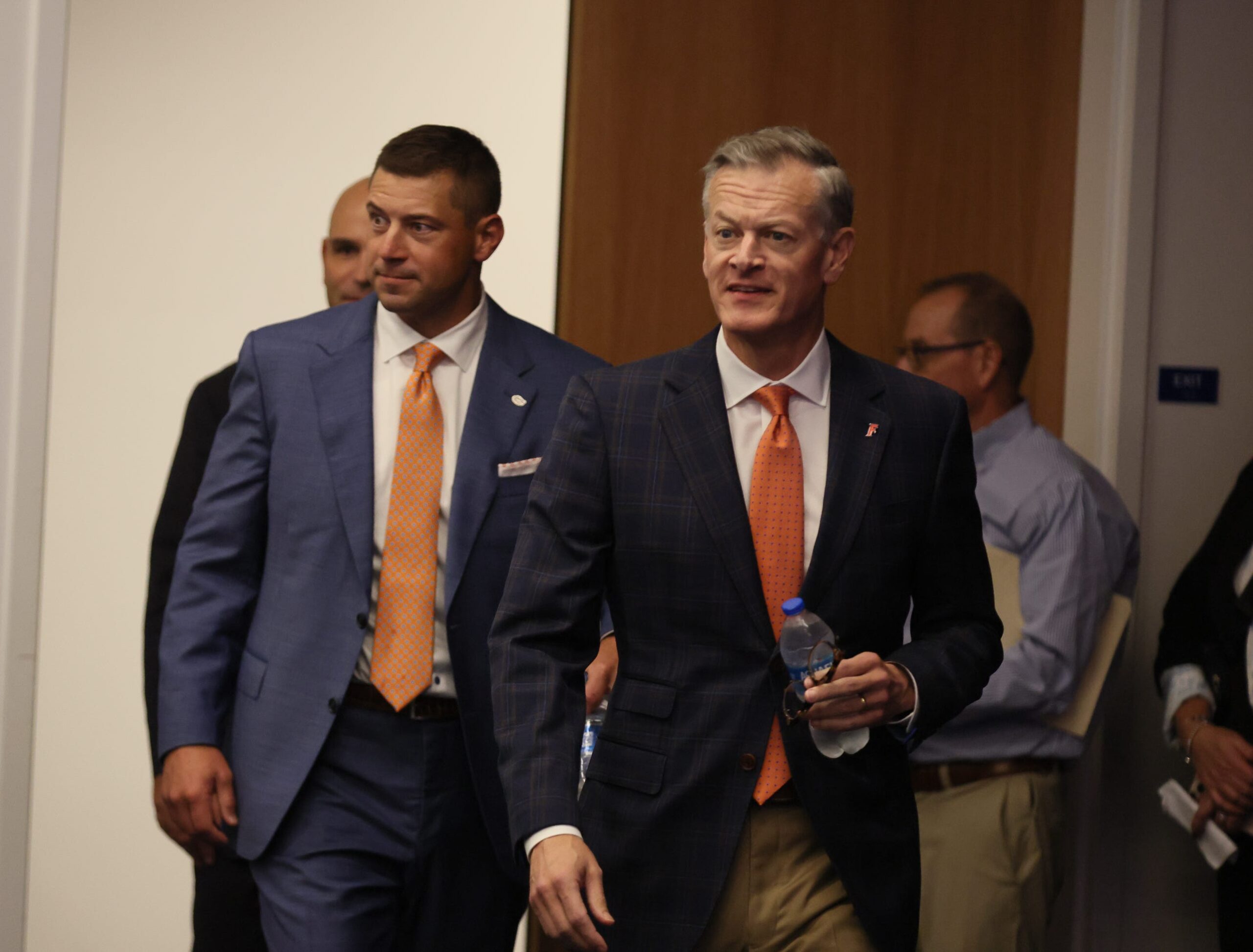 New UF head football coach Jon Sumrall, left, and UF Athletic Director Scott Stricklin arrives at the James W. “Bill” Heavener Football Training Center in Gainesville, FL on Monday, December 1, 2025.