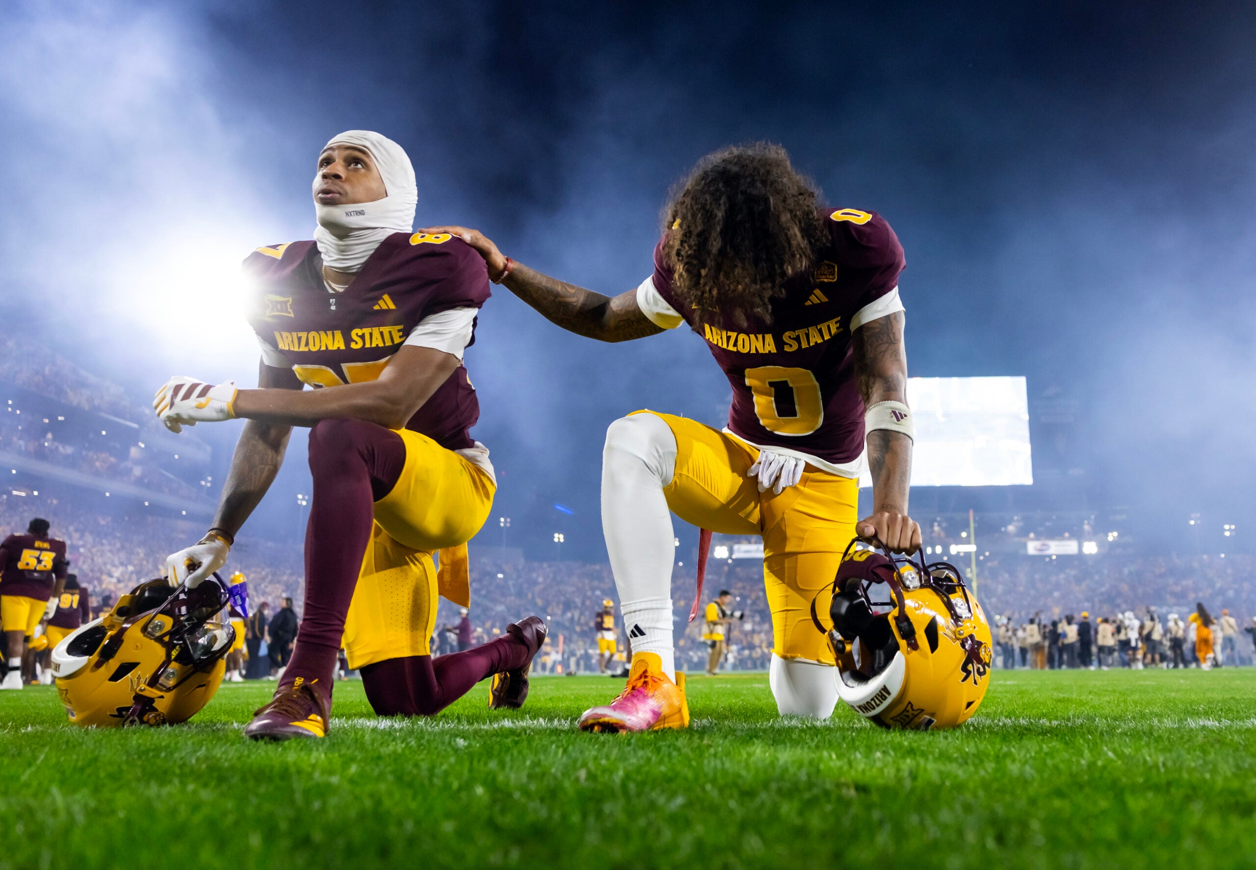 Nov 28, 2025; Tempe, Arizona, USA; Arizona State Sun Devils wide receiver Jordyn Tyson (0) with Zechariah Sample (87) against the Arizona Wildcats during the 99th Territorial Cup at Mountain America Stadium.