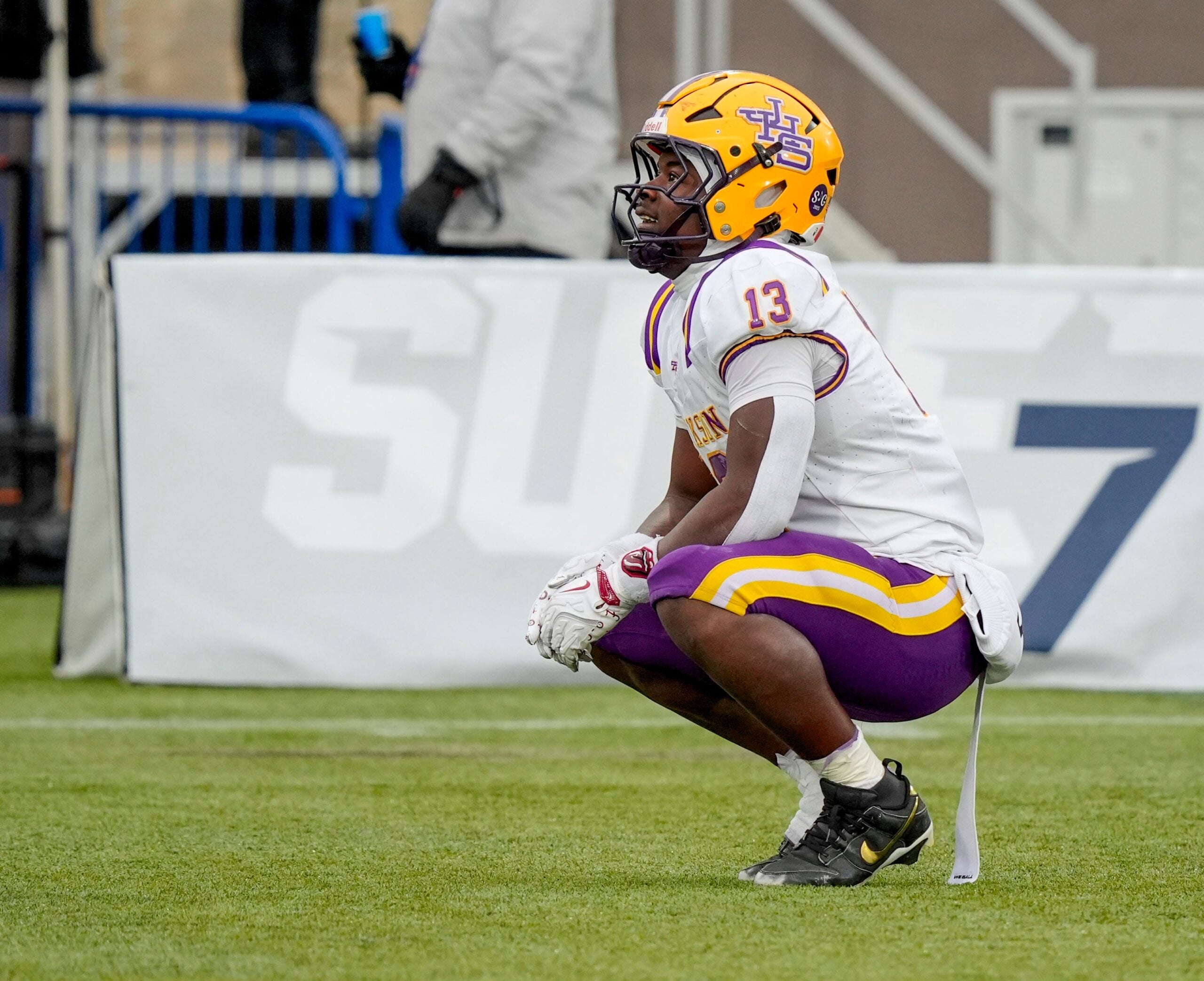 Dec 5, 2025; Birmingham, AL, USA; Jackson's EJ Crowell (13) watches a replay of his touchdown run against Anniston at Protective Life Stadium in the AHSAA 4A State Championship game.
