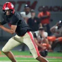 Mooney quarterback Davin Davidson (#4) scrambles as he looks for an open receiver. Cardinal Mooney Catholic High School hosted Cocoa High School for the Class 2A state semi-final football game Friday evening, Dec. 5, 2025. Mooney won the game 40-0.