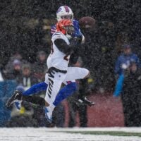Cincinnati Bengals cornerback DJ Turner II (20) breaks up a pass to Buffalo Bills wife receiver Keon Coleman (0) in the second quarter of the NFL Week 14 game between the Buffalo Bills and the Cincinnati Bengals at Highmark Stadium in Orchard Park, N.Y., on Sunday, Dec. 7, 2025.