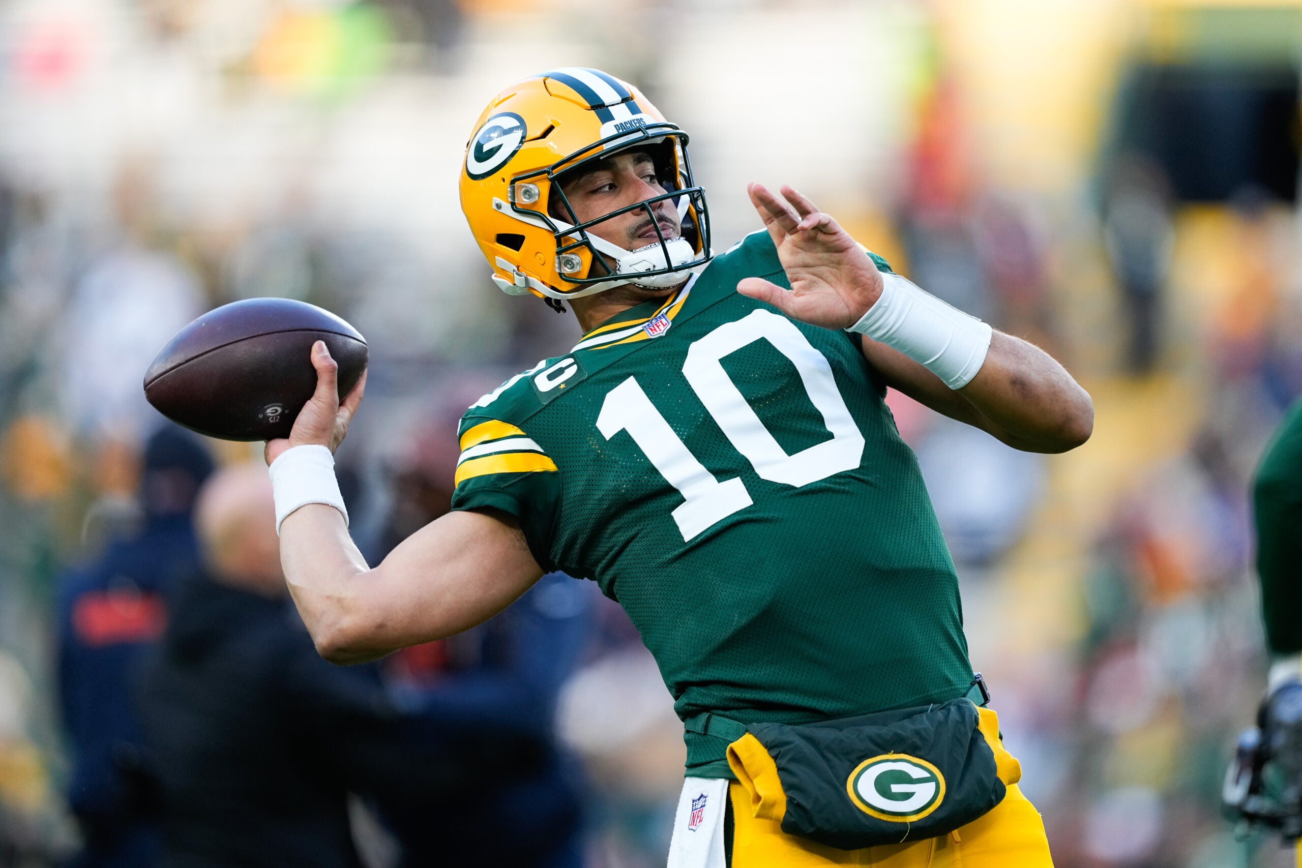 Dec 7, 2025; Green Bay, Wisconsin, USA; Green Bay Packers quarterback Jordan Love (10) warms up before the game against the Chicago Bears at Lambeau Field.