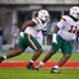Nov 1, 2025; Dallas, Texas, USA; Miami Hurricanes defensive lineman Rueben Bain Jr. (4) and defensive lineman David Blay (11) rushes the line during the game between the Mustangs and the Hurricanes at Gerald J. Ford Stadium.