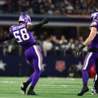 Dec 14, 2025; Arlington, Texas, USA; Minnesota Vikings linebacker Jonathan Greenard (58) and Minnesota Vikings linebacker Andrew van Ginkel (43) celebrate after a play during the first half against the Dallas Cowboys at AT&T Stadium.