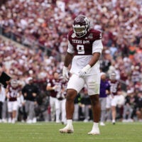 Dec 20, 2025; College Station, TX, USA; Texas A&M Aggies defensive end Cashius Howell (9) reacts during first half of the first round game of the CFP National Playoff against the Miami Hurricanes at Kyle Field.