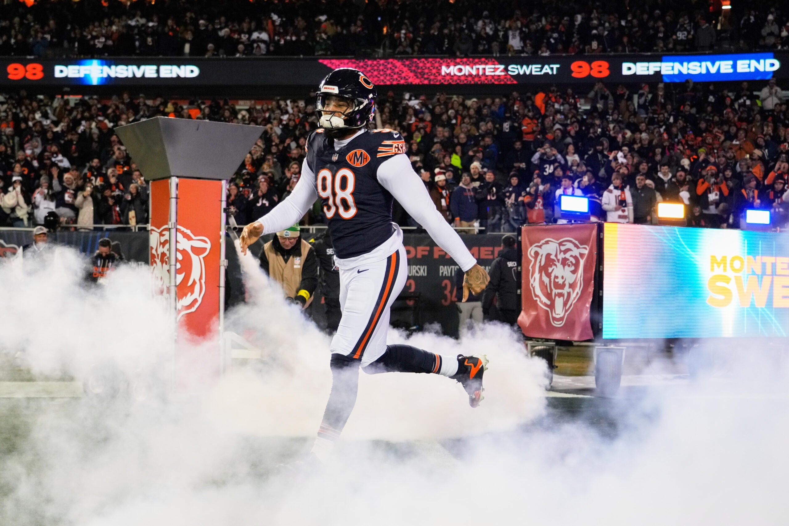 Dec 20, 2025; Chicago, Illinois, USA; Chicago Bears defensive end Montez Sweat (98) runs onto the field during player introductions before the game against the Green Bay Packers at Soldier Field.