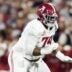 Dec 19, 2025; Norman, OK, USA; Alabama Crimson Tide offensive lineman Kadyn Proctor (74) against the Oklahoma Sooners during the CFP National Playoff First Round at Gaylord Family Oklahoma Memorial Stadium.