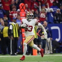 Dec 22, 2025; Indianapolis, Indiana, USA; San Francisco 49ers linebacker Dee Winters (53) carries the ball after an interception for a touchdown against the Indianapolis Colts in the fourth quarter of the game at Lucas Oil Stadium.