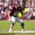 Dec 20, 2025; College Station, TX, USA; Texas A&M Aggies offensive lineman Trey Zuhn III (60) blocks the rush during the game between the Aggies and the Hurricanes at Kyle Field.