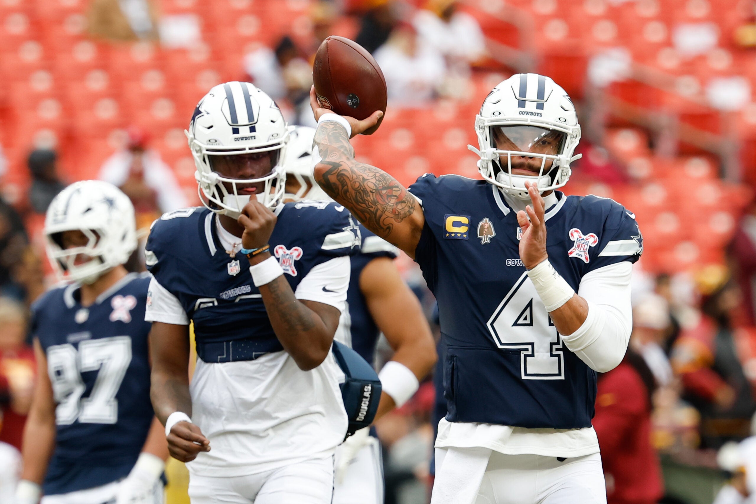 Dec 25, 2025; Landover, Maryland, USA; Dallas Cowboys quarterback Dak Prescott (4) warms up before the game against the Washington Commanders at Northwest Stadium.