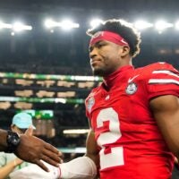 Ohio State Buckeyes defensive back Caleb Downs (2) leaves the field following the Cotton Bowl at AT&T Stadium in Arlington, Texas for the College Football Playoff quarterfinal game against the Miami Hurricanes on Dec. 31, 2025. Ohio State lost 24-14.