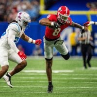 Georgia wide receiver Colbie Young (8) carries the ball after coming down with it from a pass during the Sugar Bowl and College Football Playoff quarterfinals at Caesars Superdome in New Orleans, La., on Thursday, Jan. 1, 2026. Ole Miss defeated Georgia 39-34.