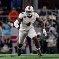 Arlington, TX, USA; Miami Hurricanes defensive lineman Rueben Bain Jr. (4) rushes the line during the 2025 Cotton Bowl and quarterfinal game of the College Football Playoff at AT&T Stadium.