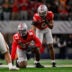 Arlington, TX, USA; Ohio State Buckeyes defensive end Kenyatta Jackson Jr. (97) and linebacker Sonny Styles (0) get into position during the 2025 Cotton Bowl and quarterfinal game of the College Football Playoff at AT&T Stadium.