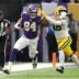 Minnesota Vikings tight end Josh Oliver (84) stiff arms Green Bay Packers linebacker Jamon Johnson (48) on a first down reception during their football game Sunday, January 4, 2026, at U.S. Bank Stadium in Minneapolis, Minnesota.